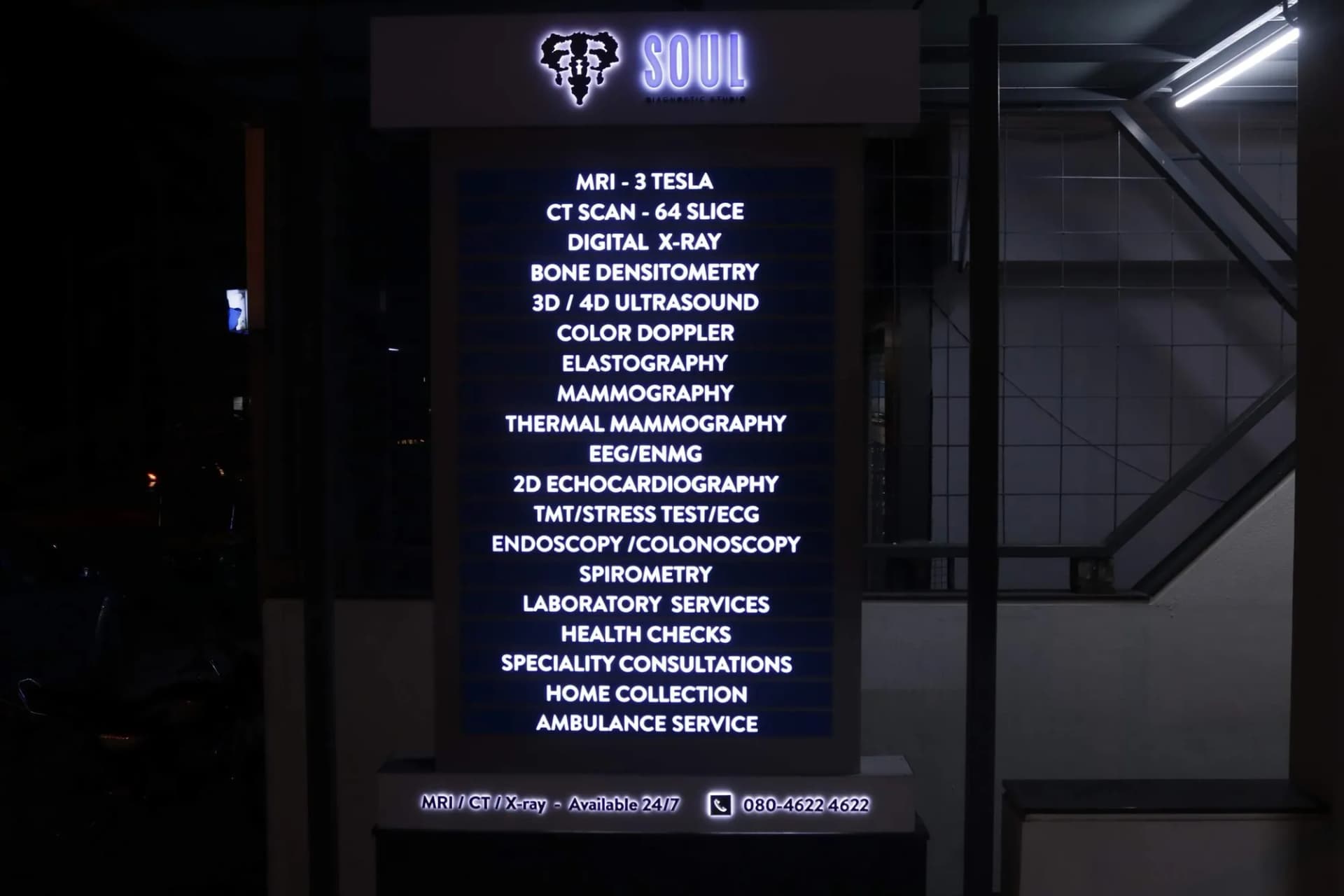 Soul Diagnostic Studio services totem lit at night