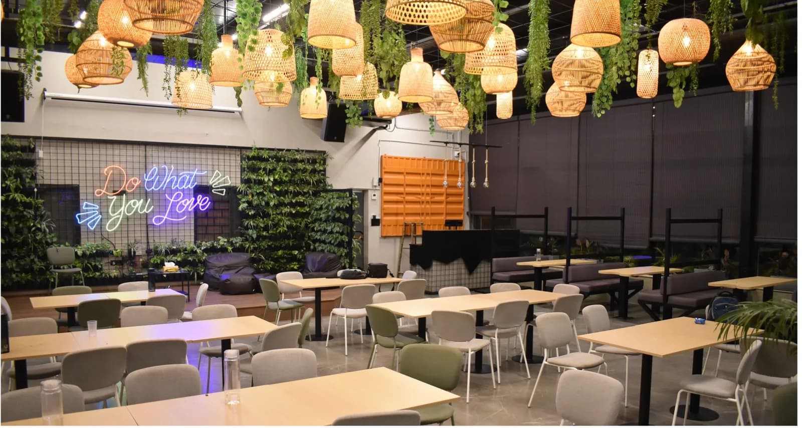 Members gathered in a branded co-working common area
