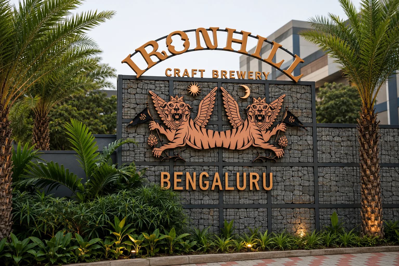 Ironhill Craft Brewery Bengaluru sign with winged tigers on a gabion wall