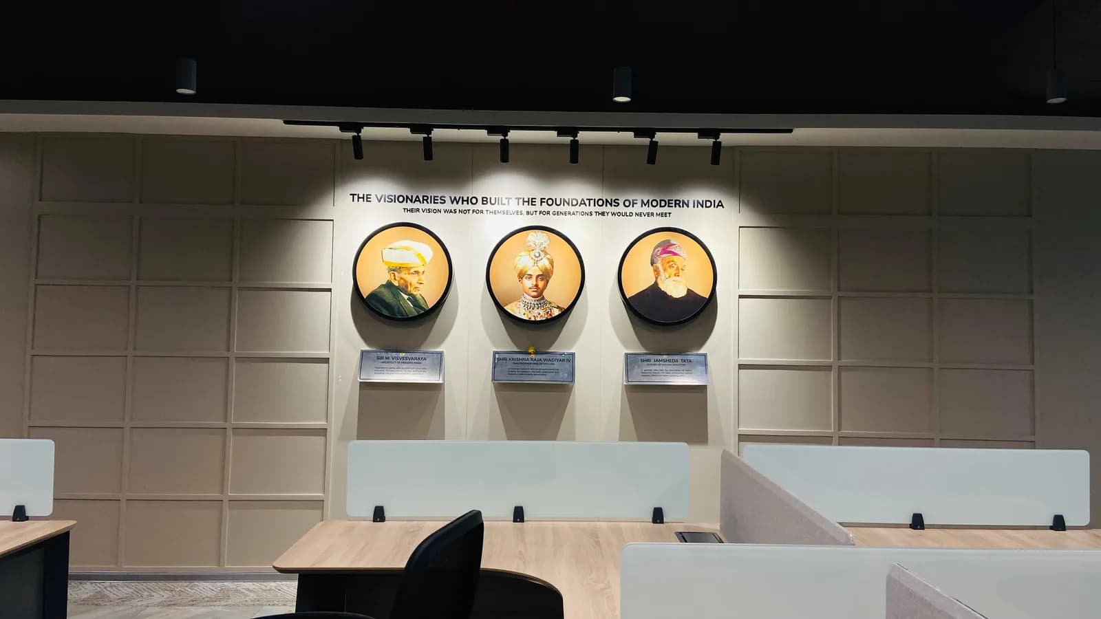 Scientific Games reception feature wall with a backlit brand logo
