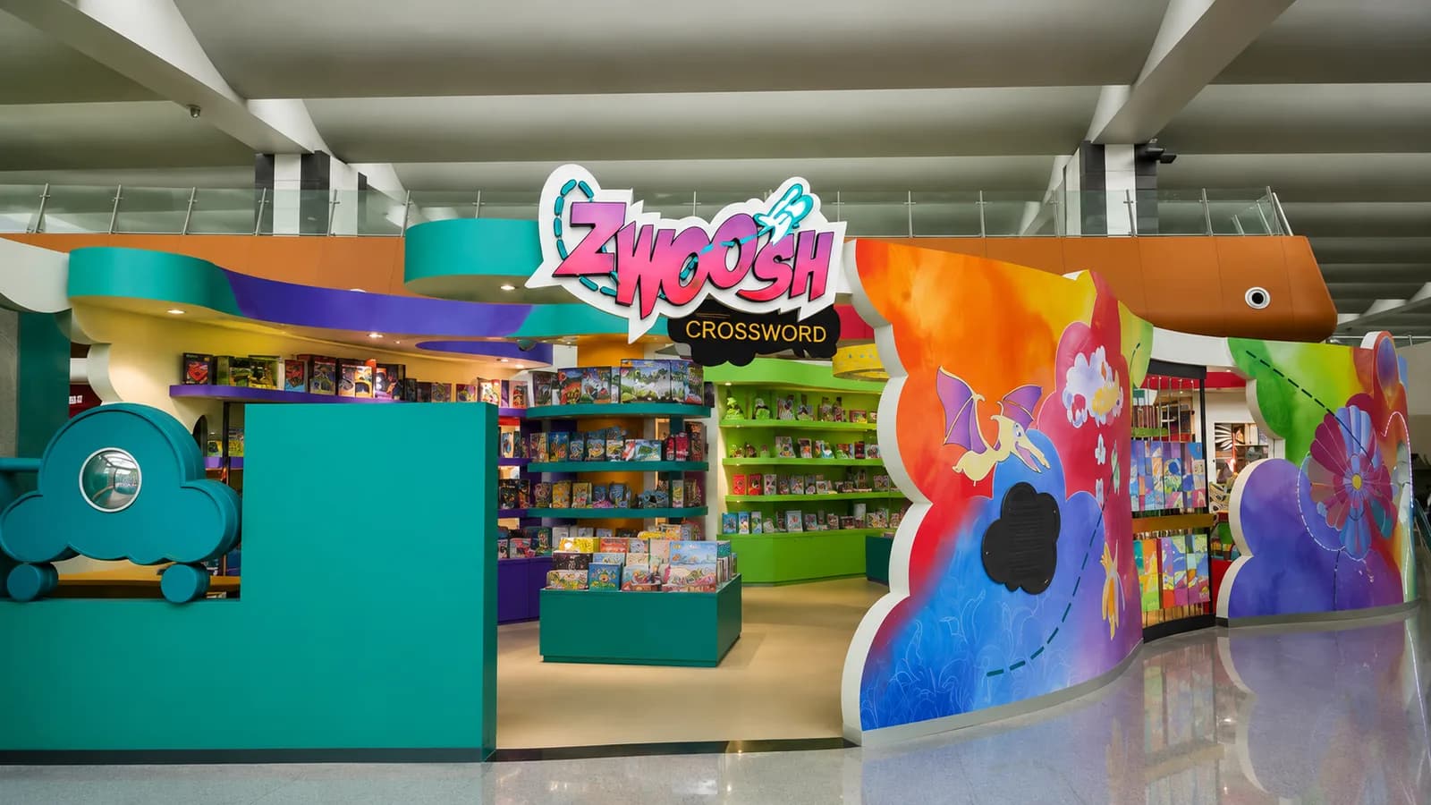 Zwoosh kids section at Crossword with colourful curved walls
